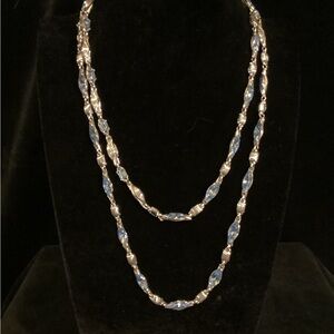 Silver and blue topaz colored crystal beaded necklace.  20” from neckline